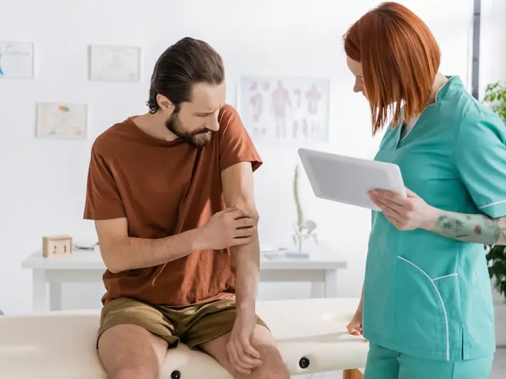 injury clinic visit near Oak Hill for back pain after slip on wet home steps